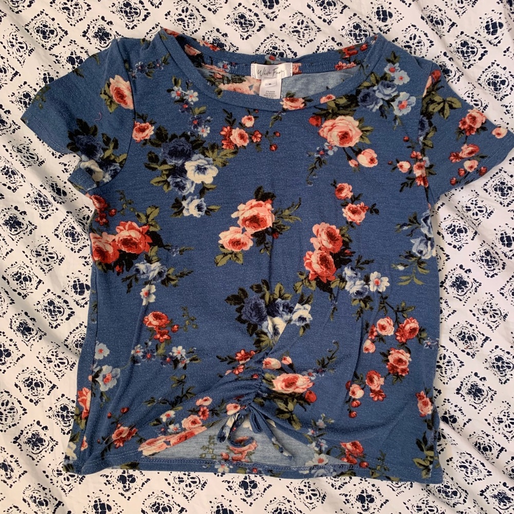 Blue floral shirt with a knot in the front